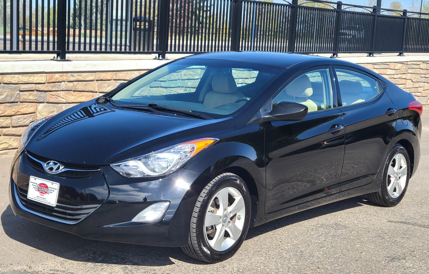 2013 Black /Tan Hyundai Elantra GLS (KMHDH4AE8DU) with an 1.8L I4 engine, 6 Speed Auto transmission, located at 450 N Russell, Missoula, MT, 59801, (406) 543-6600, 46.874496, -114.017433 - Low Mile Front Wheel Drive Sedan. One Owner. Excellent Fuel Economy. 1.8L I4 Engine. 6 Speed Automatic Transmission. AirConditioning. Power Windows and Locks. Bluetooth. - Photo#5